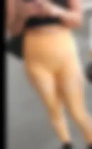 Awesome cameltoe leggings on the street: chubby girl wearing a top