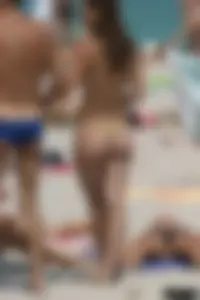 Beach voyeur girls in bikinis, thongs and topless