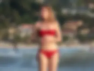 Skinny blonde babe in red bikini with camel toe and little pokies