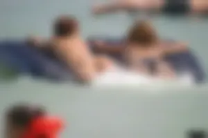 A bunch of sexy beach voyeur babes in bikinis, thongs and topless