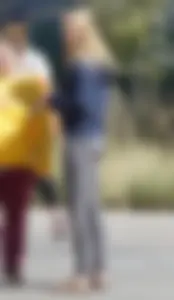 Skinny Arizona State University blonde college girl in grey leggings