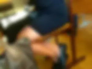 Crossed Legs of a Teen Candid College Girl in a Skirt
