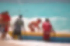 Assortment of sexy babes at the beach in bikinis