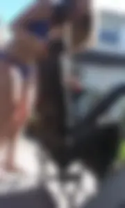 Girl in Glasses and Polka-Dot Swimsuit