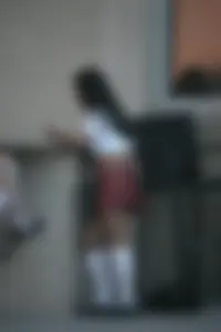 Two sexy Tilted Kilt employees showing cleavage and cheeks