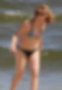 Two sexy beach teens in bikinis, one thick and one skinny with big boobs