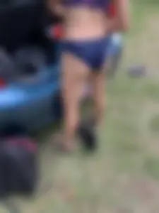 A Stocky Candid Milf in a Swimsuit Bending Over to Her Car's Trunk, Nice Firm Ass