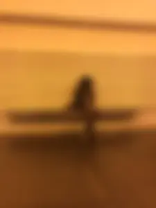 Enigmatic Girl in a Hat and Black Pantyhose at the Subway Station Candid Photo