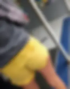 Skinny ass eating her yellow shorts