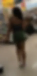 Ebony chick grocery shopping in green shorts
