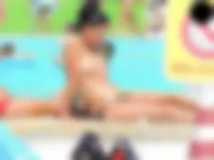 Cheetah thong wearing topless milf at the pool