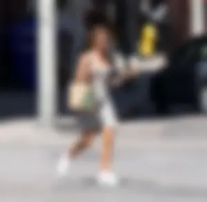 Sarah Hyland showing pokies while braless in a dress