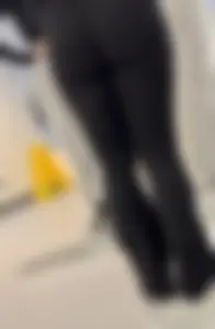 Cute College Girl With Flared Leggings And Glasses