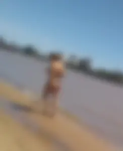 Thong girl on the beach with a great ass