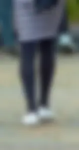 Slim legs in black pantyhose street closeups