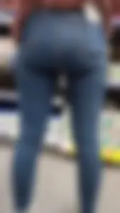 Brunette girl with nice ass sexy PAWG in tight jeans in a store