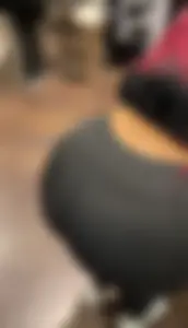 Thick ebony in leggings bent over