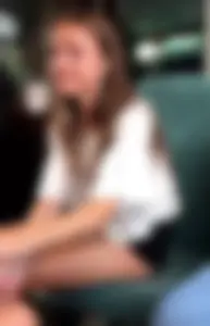 Cute skinny girl at the public train station