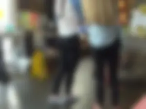 Two cute teens in a cafe creepshots gallery, leggings on both of them