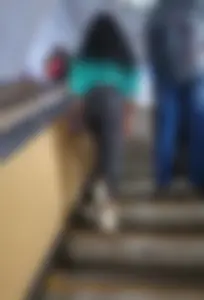 Girl in Tight Jeans Going Up The Subway Escalator Candid Photo