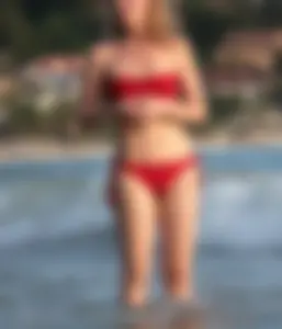 Skinny blonde babe in red bikini with camel toe and little pokies