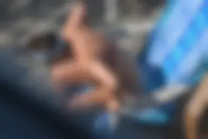 Creepshots of a neighbor milf in a bikini while sunbathing