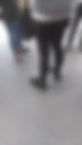 Girl wearing a black skirt over her leggings