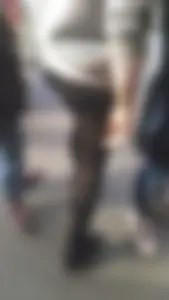 Girl wearing a black skirt over her leggings