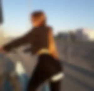 Hot Long-Haired Skinny Girl in Tights with the Bike Candid Pic