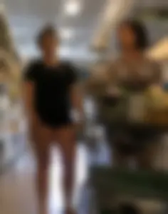 Big booty daughter in spandex shorts shopping with mom in denim shorts