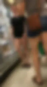 Big booty daughter in spandex shorts shopping with mom in denim shorts
