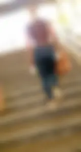 Hot booties of girls wearing tight pants, leggings and tight jeans walking up the stairs on the street creepshots