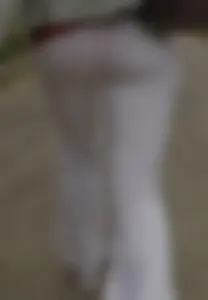 Lovely ass in white tight pants