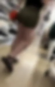 Juicy brunette in green spandex shorts OC