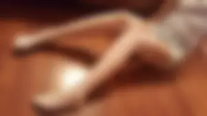 Skinny Teen in White Stockings Sitting on the Floor Selfie