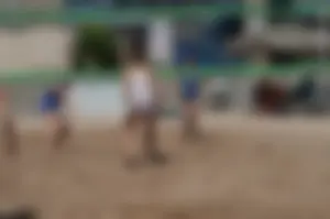 Beach volleyball blonde looking sexy and showing her body off