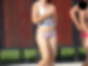 Hot chick with a nice ass at the pool in a white see through thong