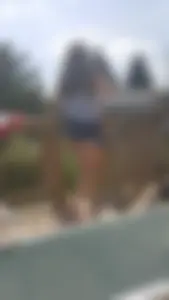 Couple of Young Girls in Jean Mini Shorts on the Backyard Pool