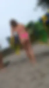 Nice tight ass and legs beautiful shape bend over in pink bikini. OC