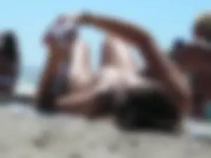 Girl with nice tits topless on the beach