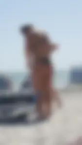 Two girls in thongs at the beach (OC)