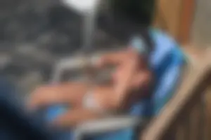 Creepshots of a neighbor milf in a bikini while sunbathing