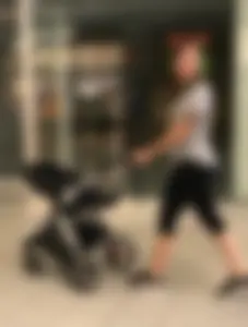 MILF in red leggings bends for the camera