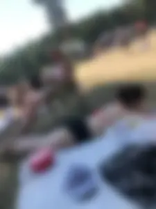 Pale Skinny Girl Lying on the Beach in Swimsuit With Crossed Legs Candid Gallery