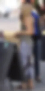Hot blonde in light leggings after getting Starbucks