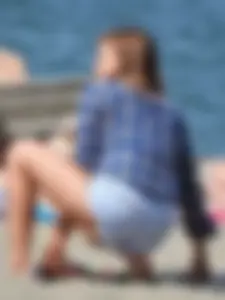 Stripping down to her bikini [016]