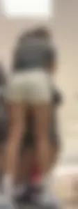 Amazing Asian in white yoga shorts upshot bends squat at Target