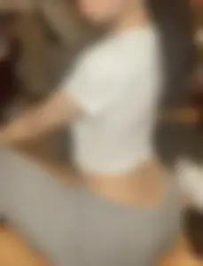 Hot And Slim Girl With Long Curly Hair in Sweatpants And a Top Creepshot