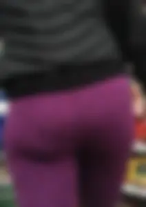 Milf shopping with a nice ass in purple leggings