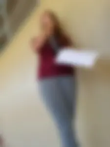 College student in grey leggings almost with camel toe showing